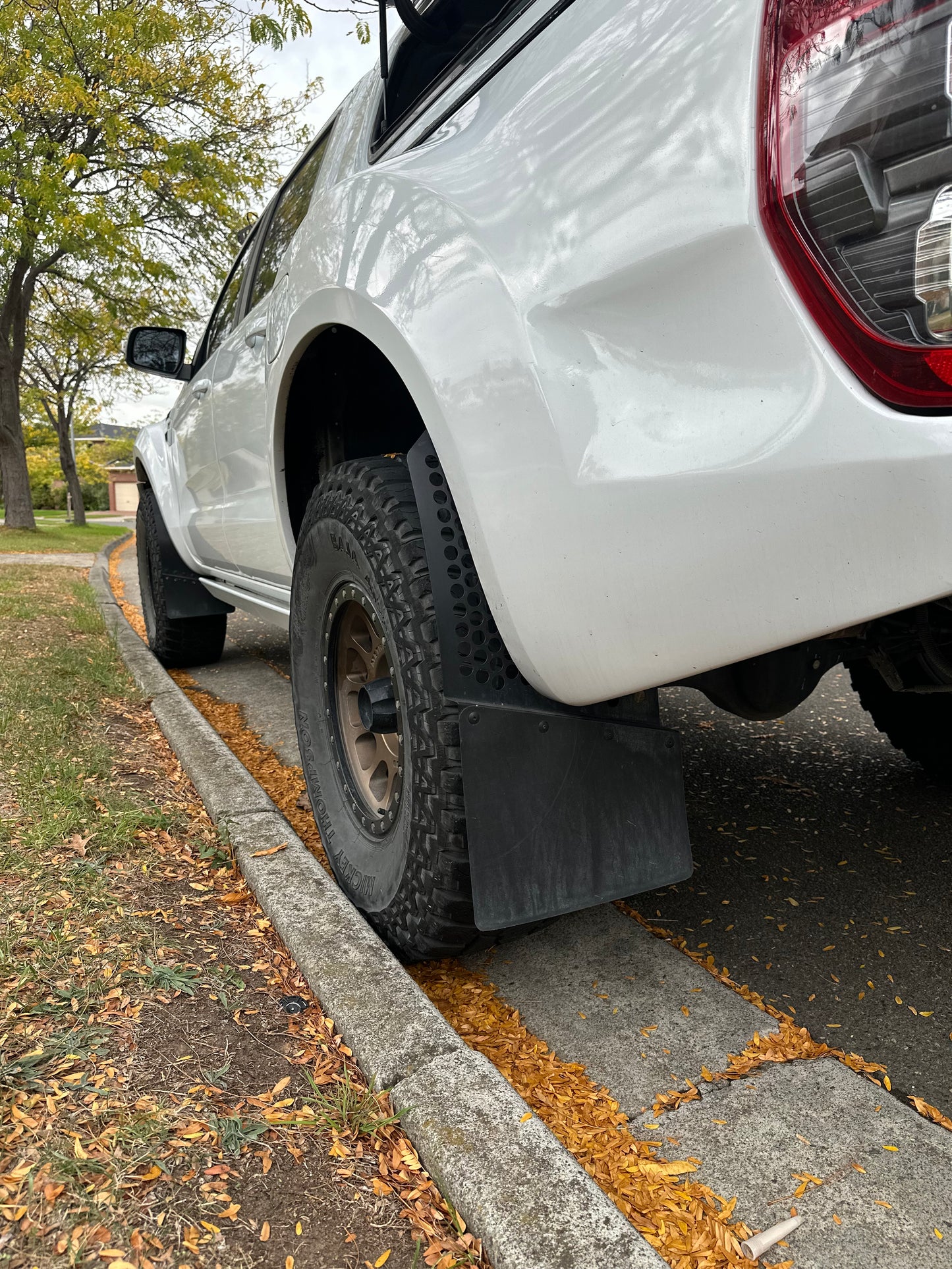 Round hole angled offset mudflaps 350mm wide